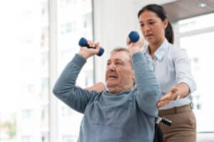 Bridge Crest Post Acute skilled nurse working with resident